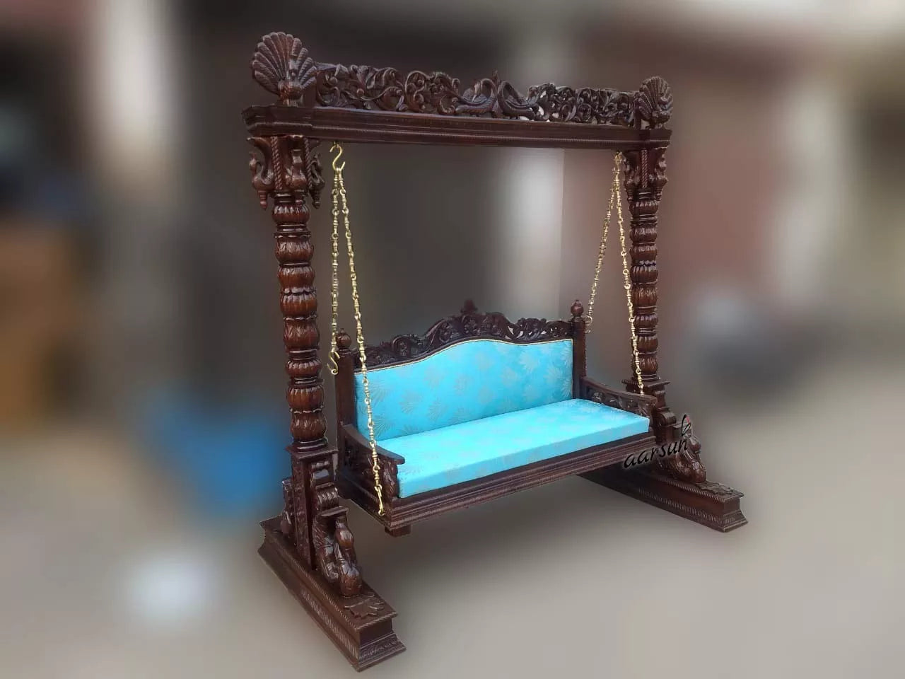 Beautifully Carved Wooden Swing for Indoor Spaces